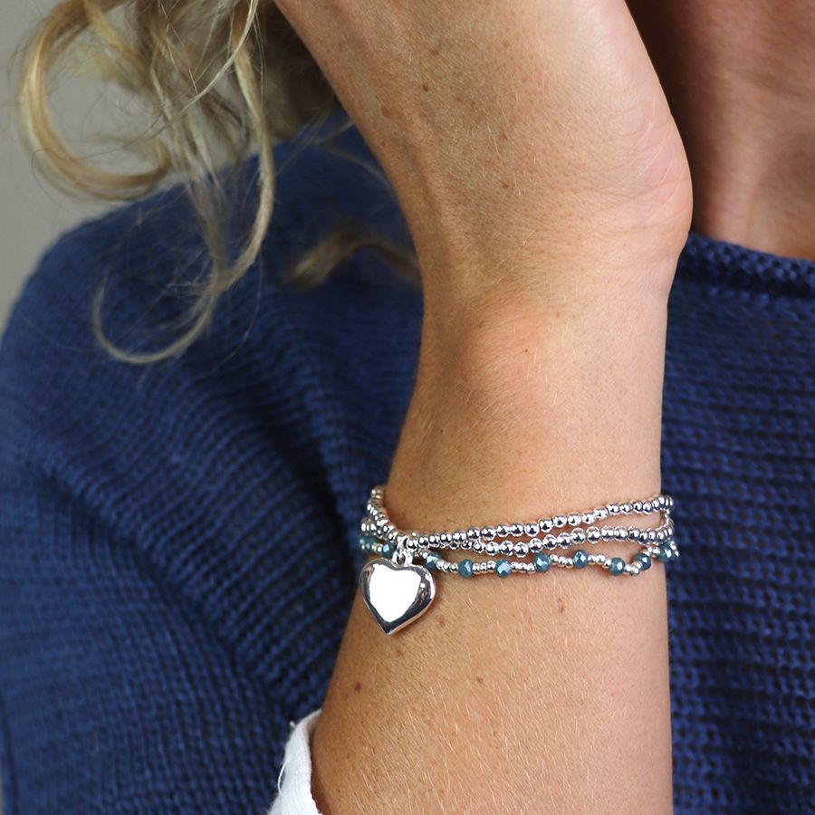 Silver plated and blue bead bracelet with heart charm