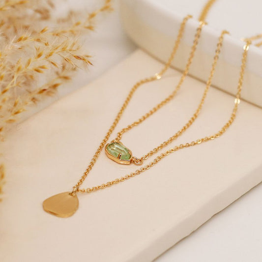 Golden brushed organic drop and aqua crystal double layer necklace