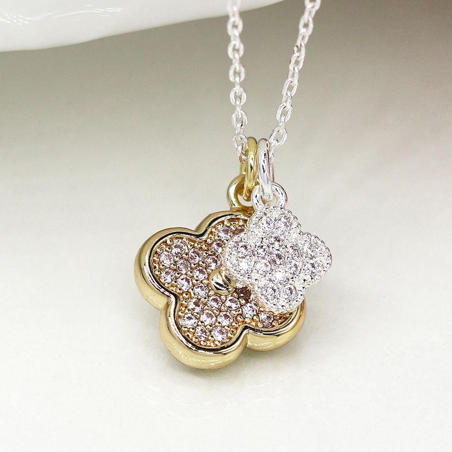 Faux gold and silver plated double quatrefoil necklace with crystals