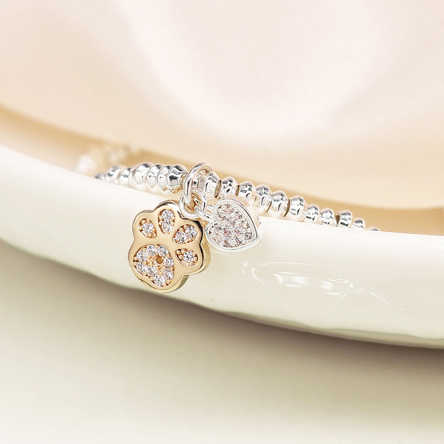 Crystal heart and golden paw charm bracelet - silver plated